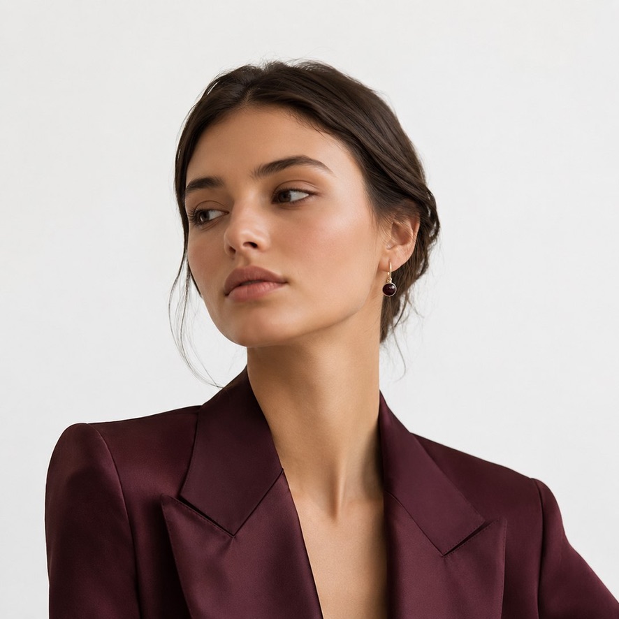 Woman Wearing Garnet Earrings